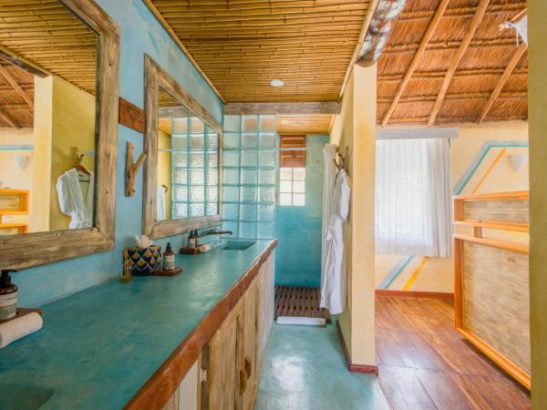 Villa Pescadores Tulum : photo 6 de la chambre suite lit king-size - vue sur océan