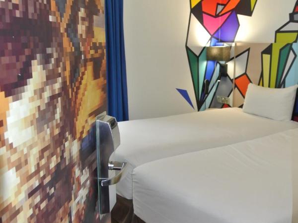 ibis Styles Paris Maine Montparnasse : photo 9 de la chambre chambre lits jumeaux standard