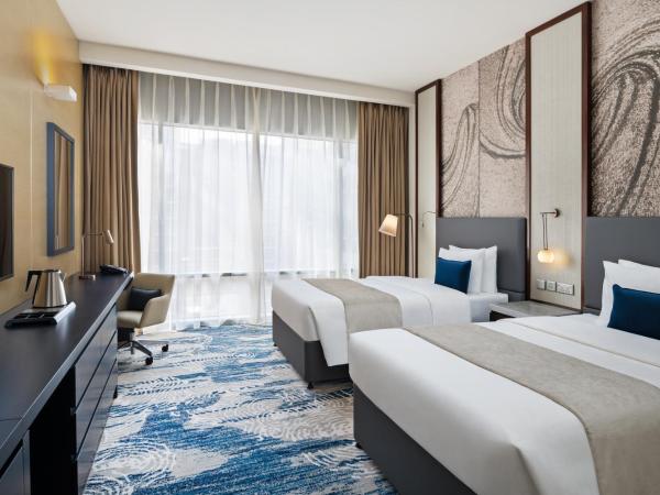 Wyndham Dubai Deira : photo 1 de la chambre chambre pour personnes à mobilité réduite - vue sur ville