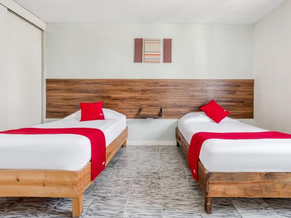 Hotel Suites Puebla : photo 3 de la chambre chambre familiale