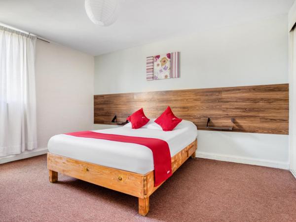 Hotel Suites Puebla : photo 4 de la chambre chambre familiale