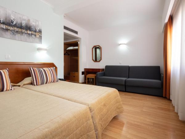 Hotel Anjos : photo 3 de la chambre chambre quadruple