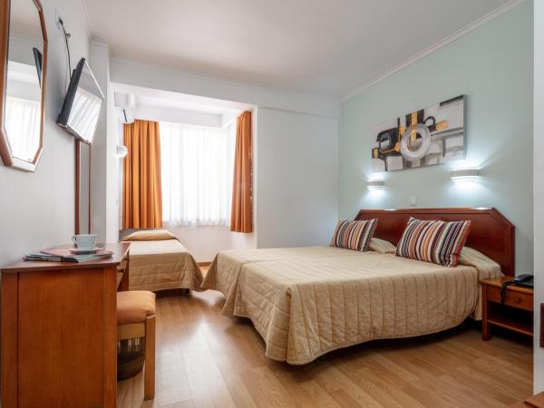 Hotel Anjos : photo 3 de la chambre chambre triple