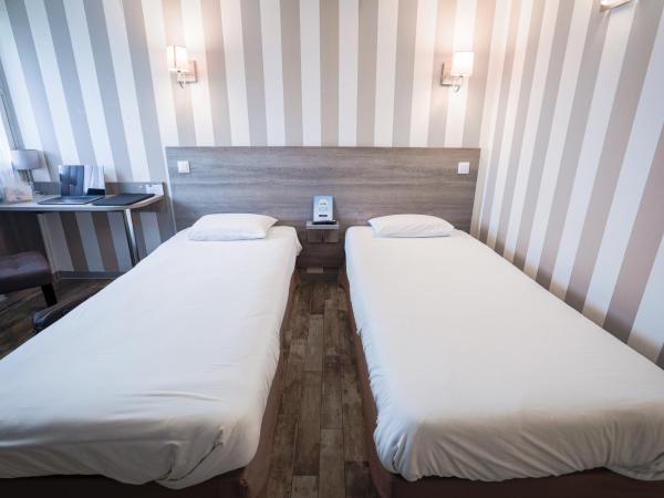 Kyriad Valenciennes Sud - Rouvignies : photo 3 de la chambre chambre lits jumeaux
