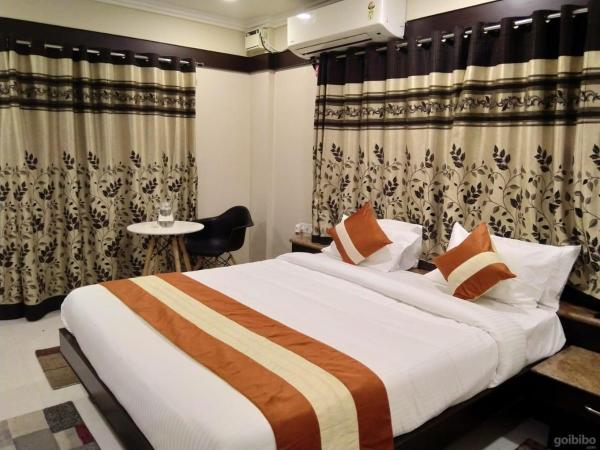 Hotel Rose Mansion Manyata Tech Park : photo 3 de la chambre suite deluxe