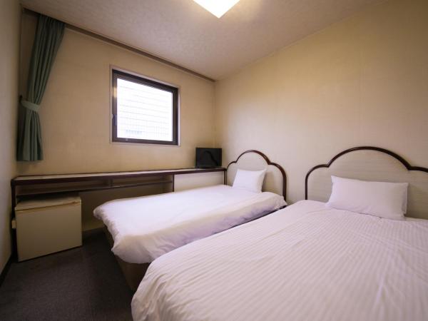 Heiwadai Hotel Otemon : photo 2 de la chambre chambre lits jumeaux - non-fumeurs