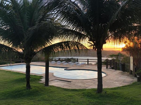 Suite Independente Por do Sol Ferradura : photo 9 de la chambre chambre double ou lits jumeaux de luxe – vue sur océan