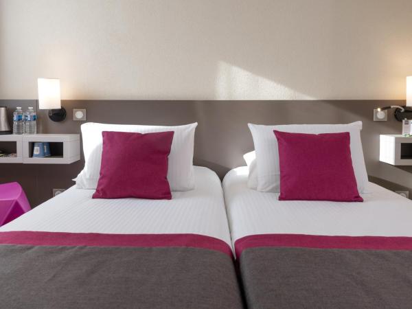 Kyriad Saint-Etienne Centre : photo 1 de la chambre chambre lits jumeaux