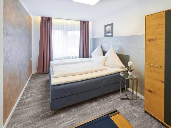 Excellentas Apartments Hannover : photo 2 de la chambre chambre lits jumeaux standard