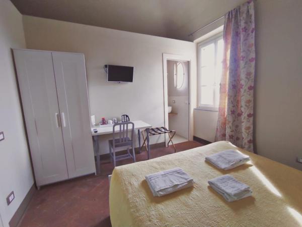 Relais Le Ortensie : photo 2 de la chambre chambre double - vue sur jardin