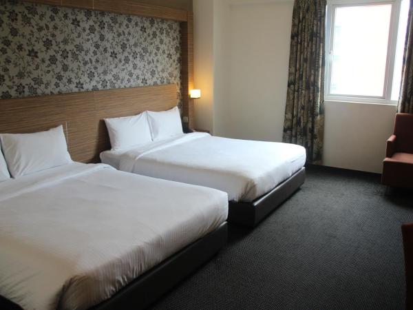 Strand Hotel : photo 1 de la chambre chambre quadruple
