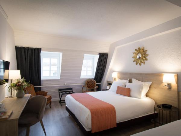 Hôtel Le Rohan, centre Cathédrale : photo 1 de la chambre chambre triple tradition