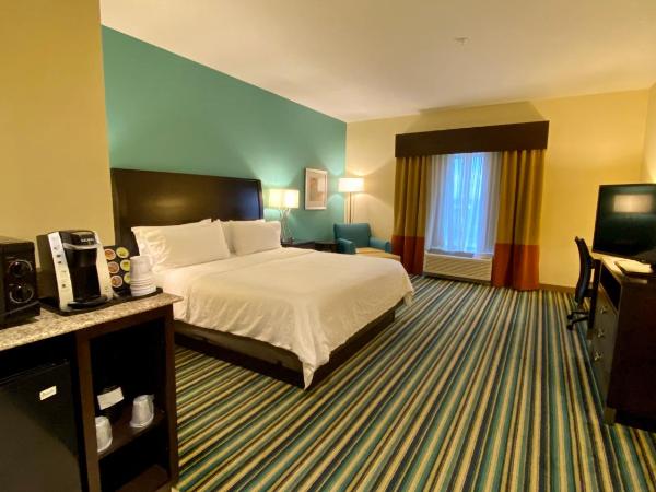 Holiday Inn Express Hotel & Suites Orlando East-UCF Area, an IHG Hotel : photo 2 de la chambre chambre lit king-size