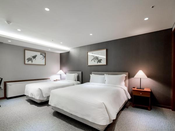 Oriens Hotel & Residences Myeongdong : photo 1 de la chambre chambre triple exécutive - sans vue