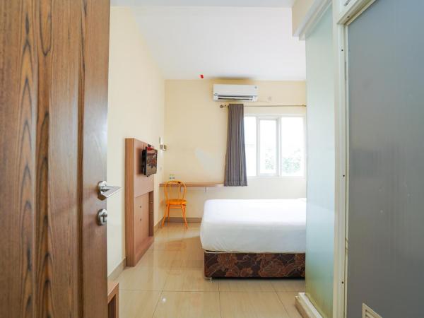Pratisarawirya Guesthouse by ecommerceloka : photo 9 de la chambre chambre double standard