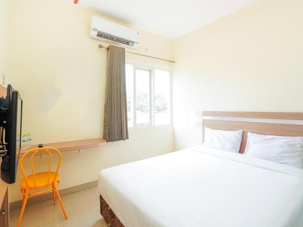 Pratisarawirya Guesthouse by ecommerceloka : photo 5 de la chambre chambre double standard