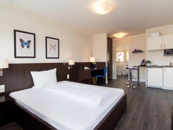 Living am Carlsplatz : photo 3 de la chambre chambre double