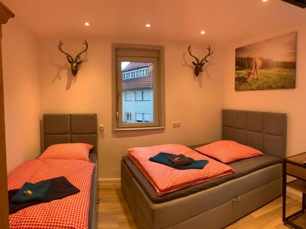 Hotel Waldhorn : photo 4 de la chambre chambre triple avec salle de bains