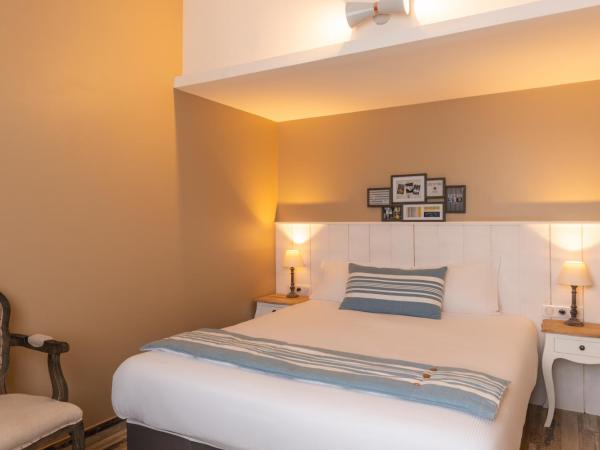 Hôtel de la Plage : photo 2 de la chambre chambre double supérieure - vue sur ville/jardin