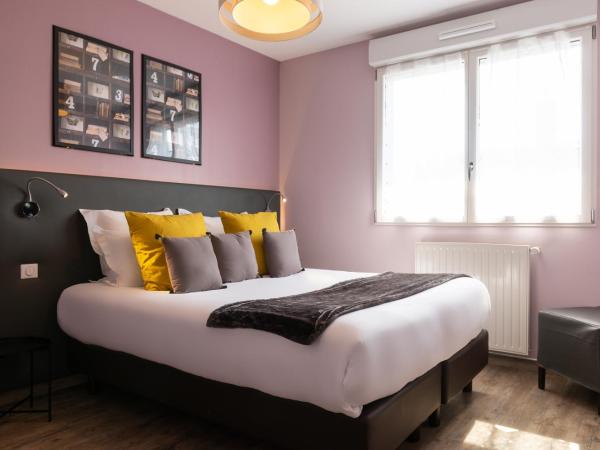 Hôtel de la Plage : photo 1 de la chambre chambre double supérieure - vue sur ville/jardin