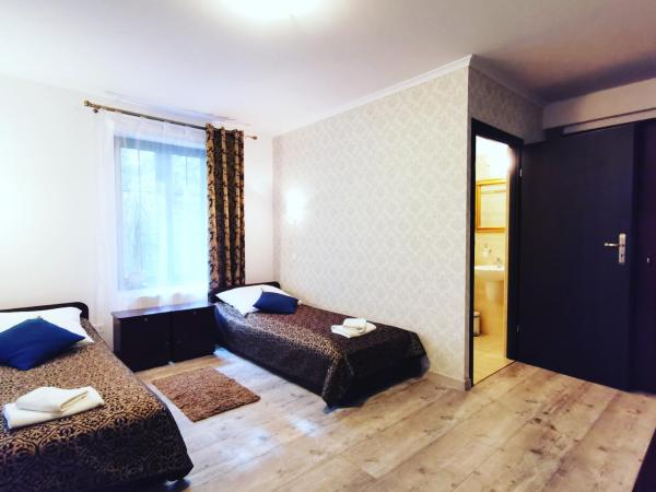 Dworek Złoty Róg Hotel i Restauracja : photo 6 de la chambre chambre lits jumeaux standard