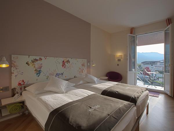 Boutique Hotel Bellevue : photo 1 de la chambre hébergement double boutique - baignoire avec vue sur rivière