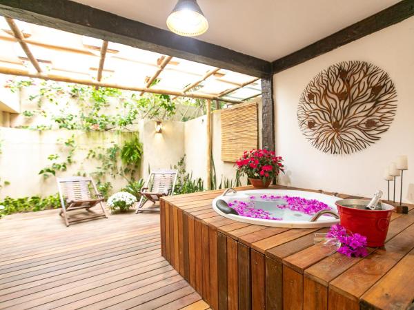 Pousada Casa do Catavento : photo 1 de la chambre suite deluxe