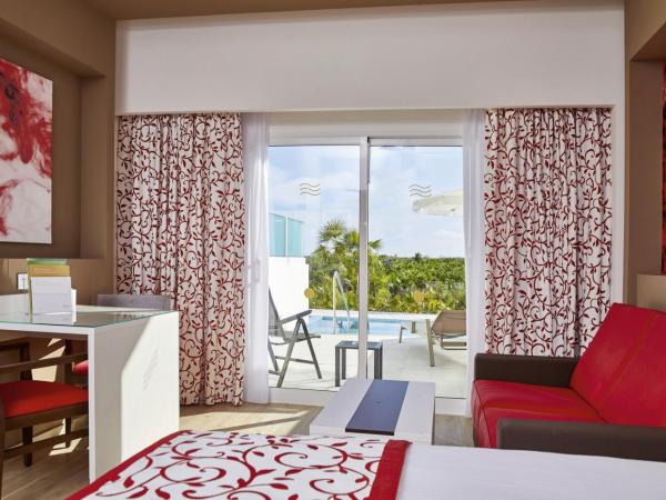 Riu Palace Costa Mujeres - All Inclusive : photo 1 de la chambre suite junior avec accès direct à la piscine - réservée aux adultes (18 ans et plus)