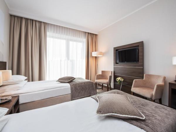 Hotel Różany Gaj - Destigo Hotels : photo 3 de la chambre chambre triple standard