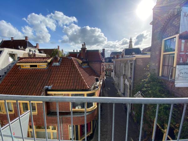 Hotel The Happy Traveler : photo 3 de la chambre chambre lit king-size avec balcon