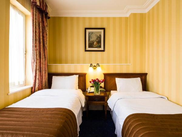 Best Western Swiss Cottage Hotel : photo 5 de la chambre chambre lits jumeaux