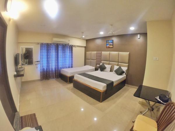 new metro residency : photo 1 de la chambre chambre lit king-size deluxe