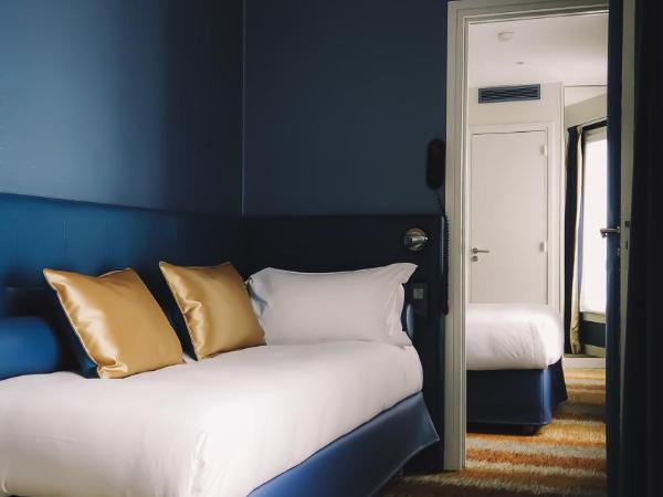 Trianon Gare de Lyon : photo 3 de la chambre chambre quadruple deluxe