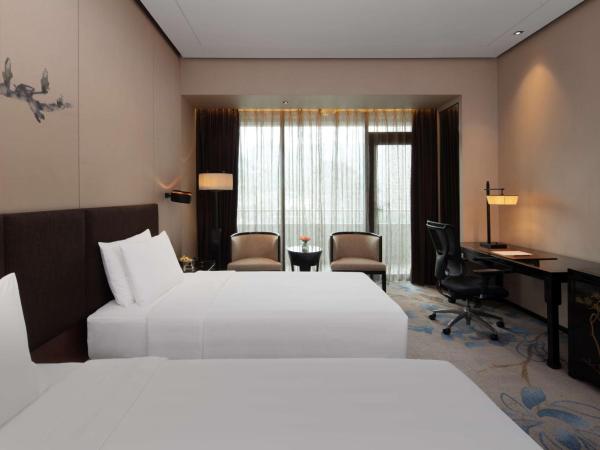 Chongqing Ronghui Grand Hotel : photo 1 de la chambre chambre deluxe