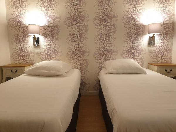 Le Royalty : photo 6 de la chambre chambre lits jumeaux