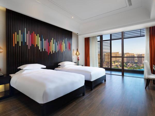 Mangrove Tree Resort World Sanya Bay-Coconut : photo 1 de la chambre chambre lits jumeaux deluxe avec vue sur le jardin