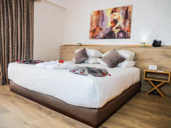 Mabrouk Hotel and Suites- Adult only : photo 2 de la chambre chambre double