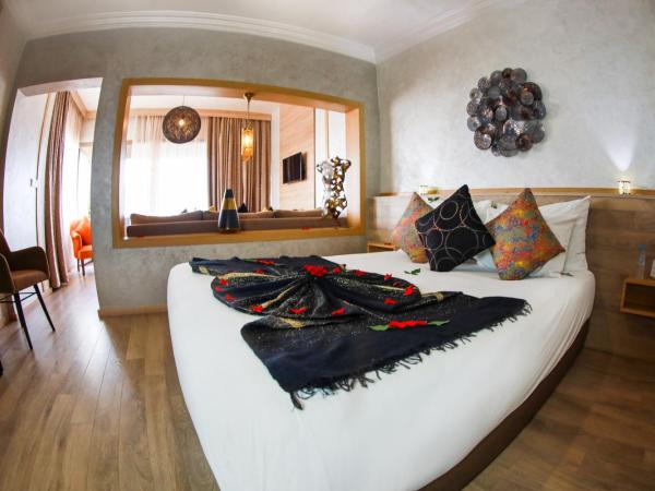 Mabrouk Hotel and Suites- Adult only : photo 3 de la chambre suite deluxe - vue sur mer