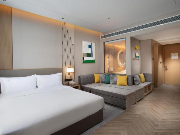 Holiday Inn Wuxi Central Station, an IHG Hotel : photo 3 de la chambre chambre lit king-size premium avec canapé-lit