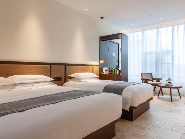 Liangyun SSAW Boutique Hotel : photo 9 de la chambre chambre familiale