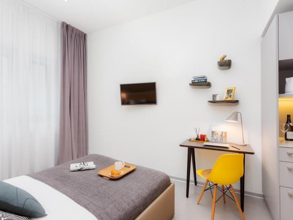 VISIONAPARTMENTS Rue des Communaux - contactless check-in : photo 5 de la chambre chambre deluxe