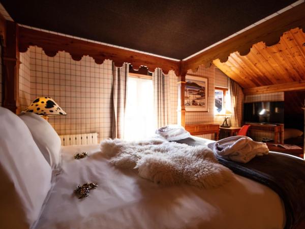 La Savoyarde : photo 4 de la chambre suite familiale avec baignoire