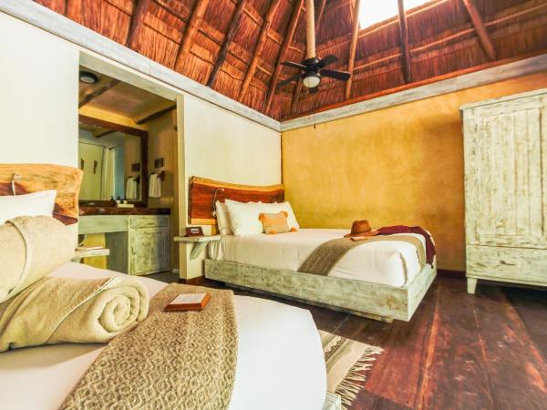Villa Pescadores Tulum : photo 1 de la chambre chambre double - vue sur jardin