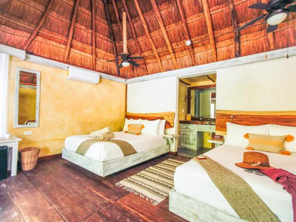 Villa Pescadores Tulum : photo 9 de la chambre chambre double - vue sur jardin