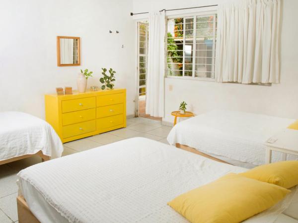 Casa Canario Hostel : photo 4 de la chambre chambre familiale supérieure