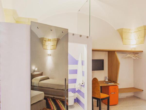 Dimora Storica Muratore : photo 3 de la chambre chambre double ou lits jumeaux standard - vue sur jardin
