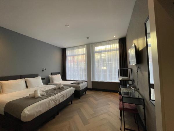 H3 Hotel Rotterdam City Center : photo 1 de la chambre chambre triple