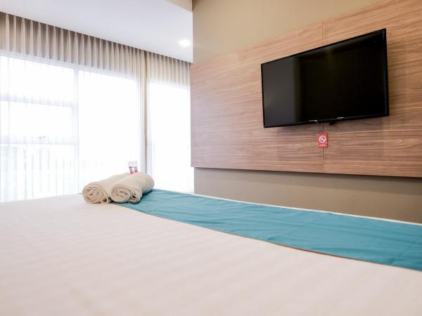 Sans Hotel Puri Indah Jakarta : photo 10 de la chambre suite