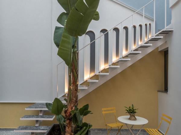 Domus Ariadne : photo 3 de la chambre chambre double ou lits jumeaux supérieure - vue sur jardin