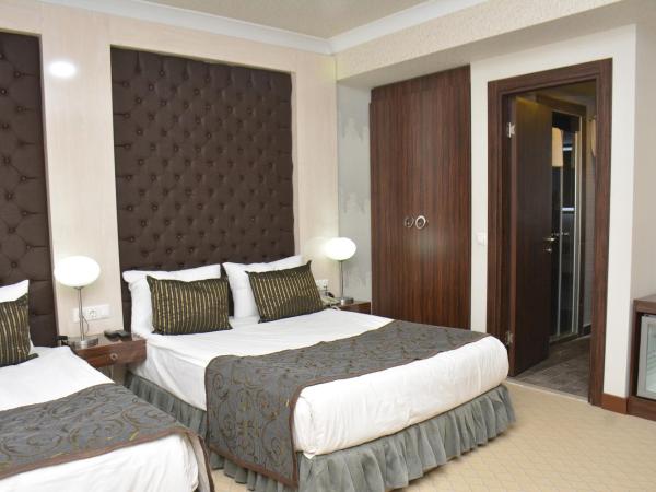 koza millenyum hotel&spa : photo 2 de la chambre chambre familiale avec salle de bains